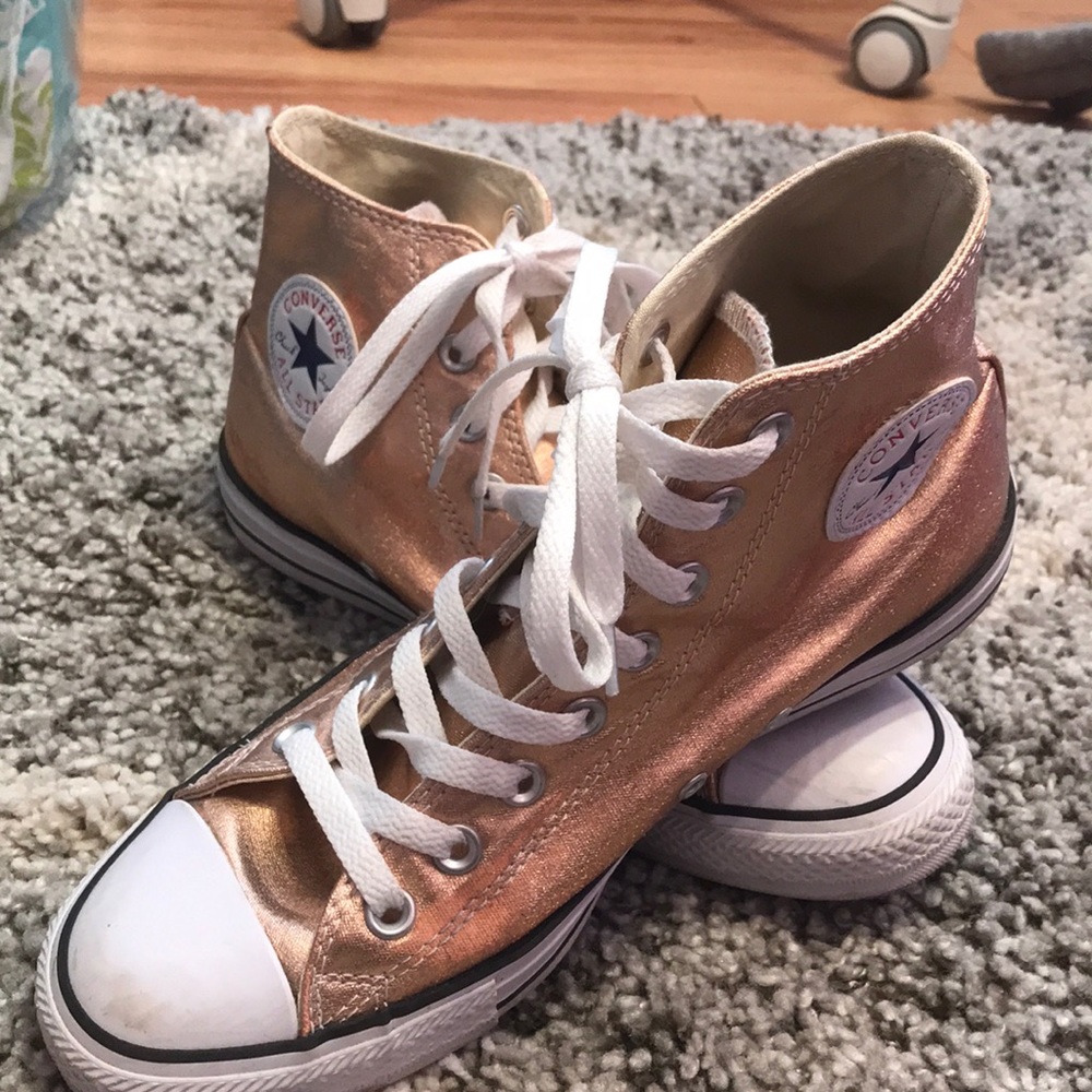 Rose gold converse high tops size 9. Barely used